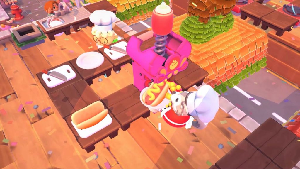 Overcooked! 2 screenshot from the Steam store page showing chefs working in a shared-screen kitchen