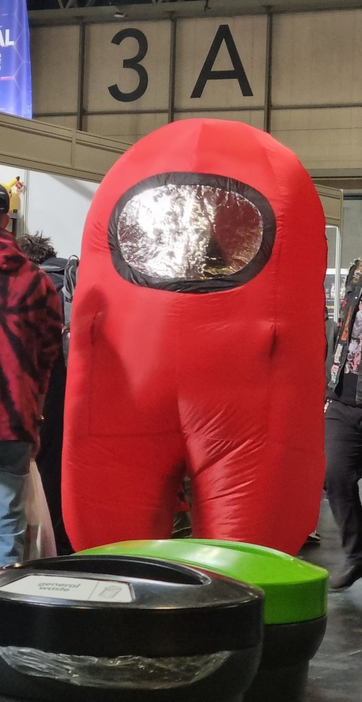 Cosplayer dressed as an Among Us crewmate at the Insomnia Gaming Festival in Birmingham